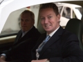 Gregory Barker arrives in the factory after a ride in the new H2EV